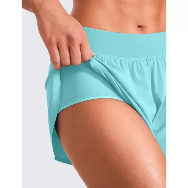 CRZ YOGA Mid Waisted Dolphin Athletic Shorts for Women Lightweight High Split Gym Workout Shorts with Liner Quick DryTurquoise