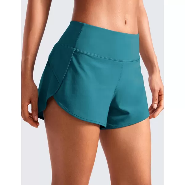 CRZ YOGA Mid Waisted Running Shorts for Women Soft Gym Athletic Workout Shorts with Zipper Pocket Liner Quick DryBorealis Green