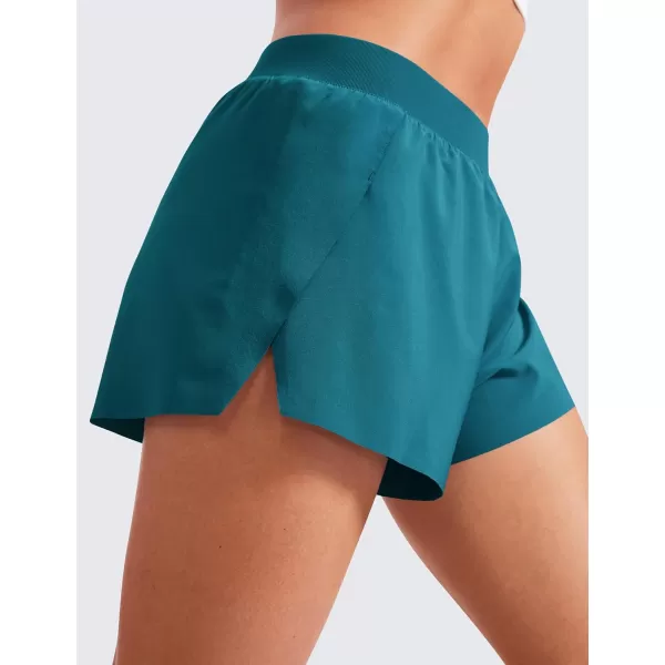 CRZ YOGA Running Shorts for Women High Waisted V Split Gym Workout Athletic Track Shorts with Mesh Liner Quick DryBorealis Green