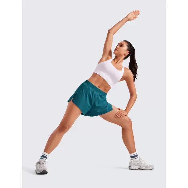 CRZ YOGA Running Shorts for Women High Waisted V Split Gym Workout Athletic Track Shorts with Mesh Liner Quick DryBorealis Green