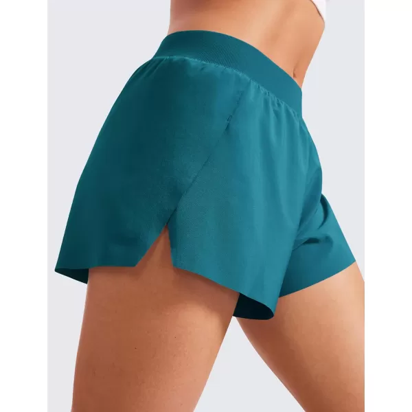 CRZ YOGA Running Shorts for Women High Waisted V Split Gym Workout Athletic Track Shorts with Mesh Liner Quick DryBorealis Green