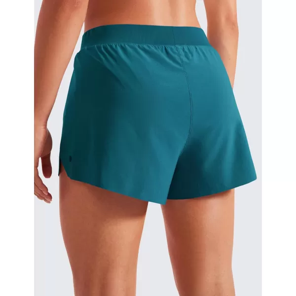 CRZ YOGA Running Shorts for Women High Waisted V Split Gym Workout Athletic Track Shorts with Mesh Liner Quick DryBorealis Green