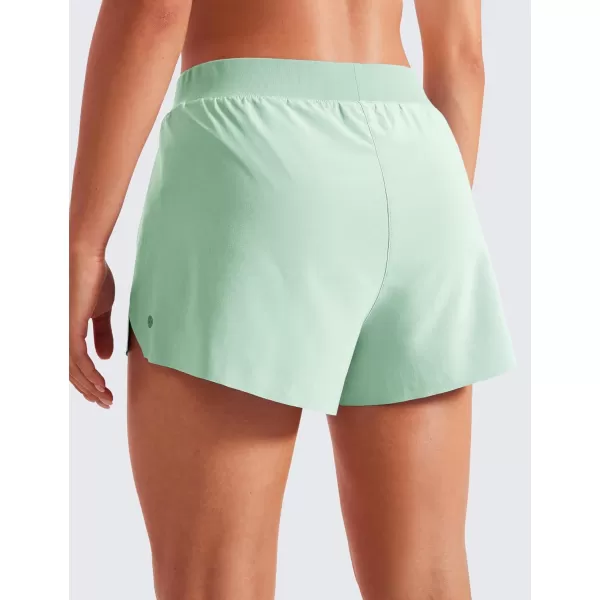 CRZ YOGA Running Shorts for Women High Waisted V Split Gym Workout Athletic Track Shorts with Mesh Liner Quick DryMint Moment