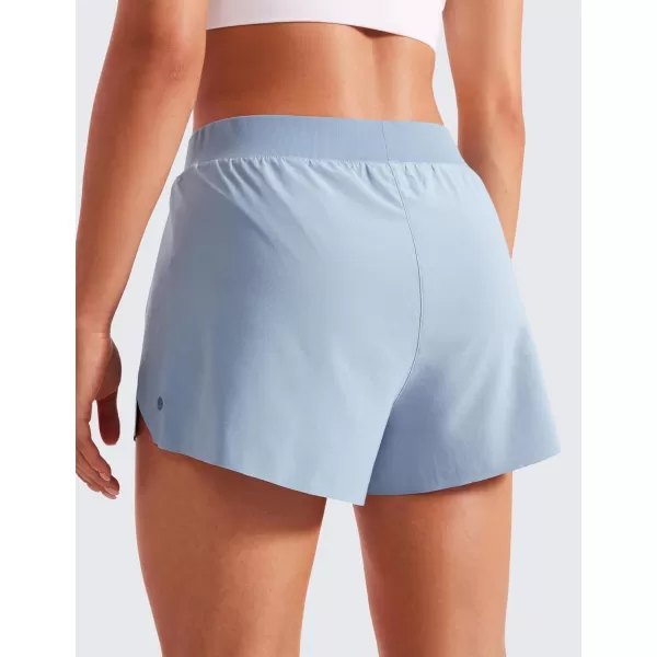 CRZ YOGA Running Shorts for Women High Waisted V Split Gym Workout Athletic Track Shorts with Mesh Liner Quick DryThe Breeze Blue