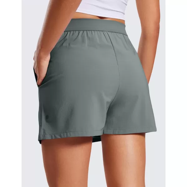 CRZ YOGA Skirt Overlay Shorts for Women High Waisted A Line Casual Golf Athletic Shorts with Pockets Cute Flat Front SkortGrey Sage