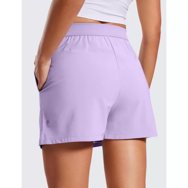 CRZ YOGA Skirt Overlay Shorts for Women High Waisted A Line Casual Golf Athletic Shorts with Pockets Cute Flat Front SkortLilac