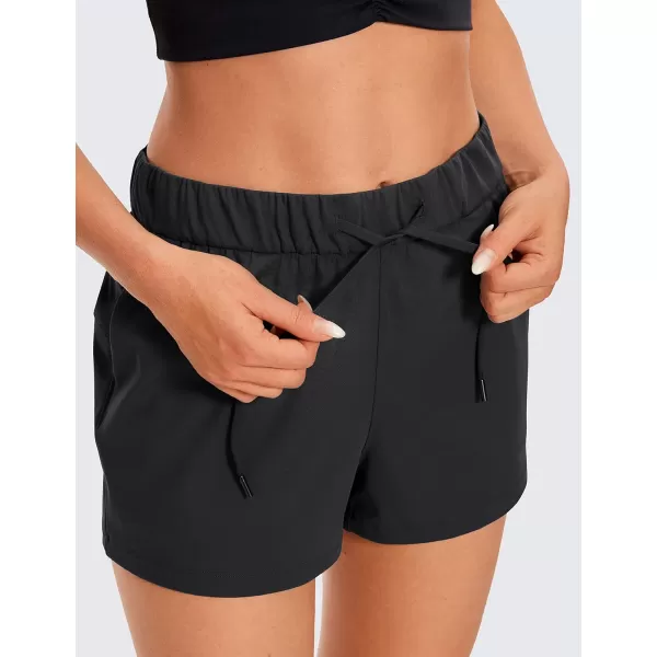 CRZ YOGA Stretch Shorts for Women Work Casual 25  Athletic Shorts with Pockets for Workout Travel Hiking GolfBlack