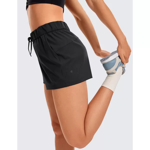CRZ YOGA Stretch Shorts for Women Work Casual 25  Athletic Shorts with Pockets for Workout Travel Hiking GolfBlack