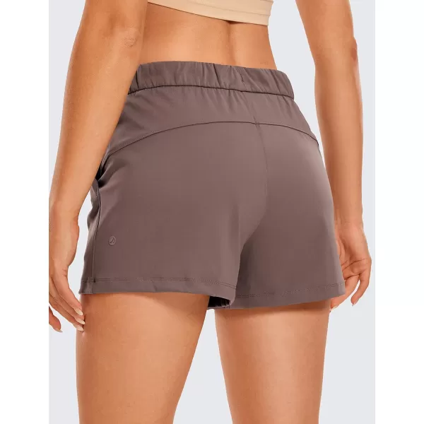 CRZ YOGA Stretch Shorts for Women Work Casual 25  Athletic Shorts with Pockets for Workout Travel Hiking GolfBrown Rock