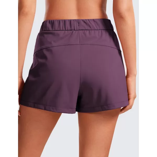 CRZ YOGA Stretch Shorts for Women Work Casual 25  Athletic Shorts with Pockets for Workout Travel Hiking GolfDeep Purple