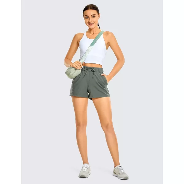 CRZ YOGA Stretch Shorts for Women Work Casual 25  Athletic Shorts with Pockets for Workout Travel Hiking GolfGrey Sage