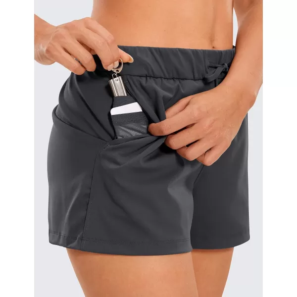 CRZ YOGA Stretch Shorts for Women Work Casual 25  Athletic Shorts with Pockets for Workout Travel Hiking GolfInk Gray