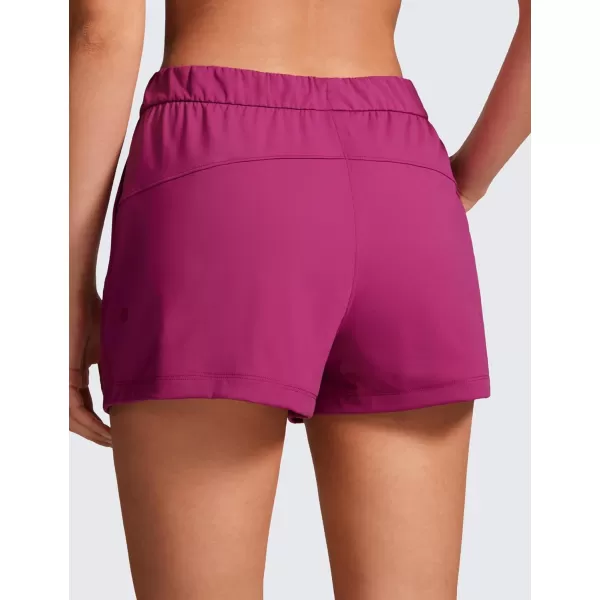CRZ YOGA Stretch Shorts for Women Work Casual 25  Athletic Shorts with Pockets for Workout Travel Hiking GolfMagenta Purple