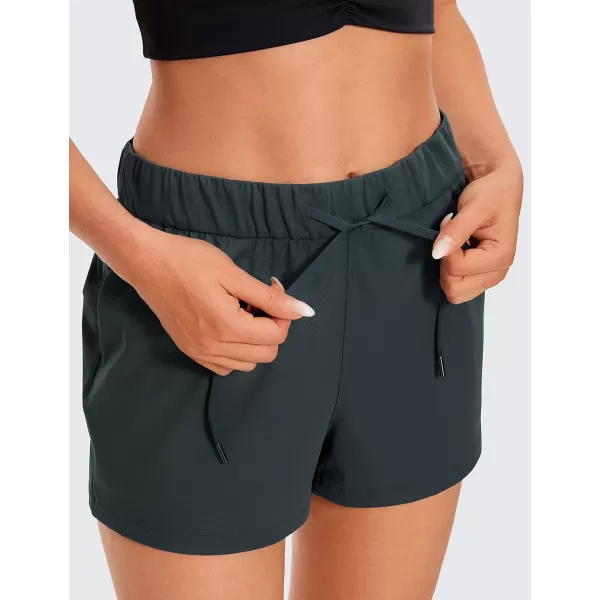CRZ YOGA Stretch Shorts for Women Work Casual 25  Athletic Shorts with Pockets for Workout Travel Hiking GolfMelanite