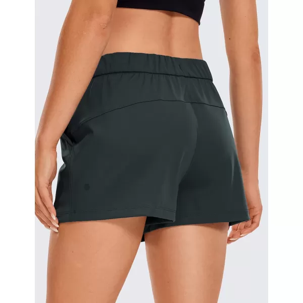 CRZ YOGA Stretch Shorts for Women Work Casual 25  Athletic Shorts with Pockets for Workout Travel Hiking GolfMelanite
