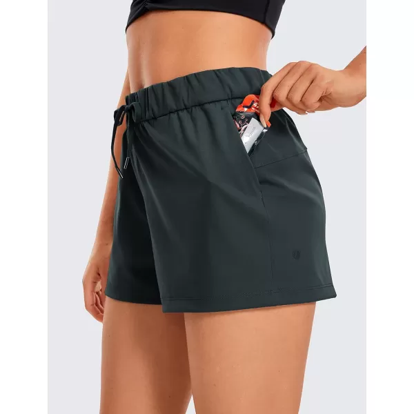 CRZ YOGA Stretch Shorts for Women Work Casual 25  Athletic Shorts with Pockets for Workout Travel Hiking GolfMelanite