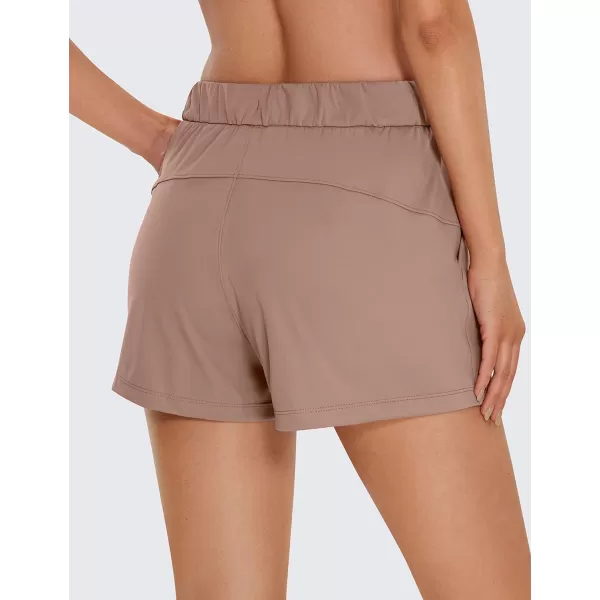 CRZ YOGA Stretch Shorts for Women Work Casual 25  Athletic Shorts with Pockets for Workout Travel Hiking GolfMineral Brown