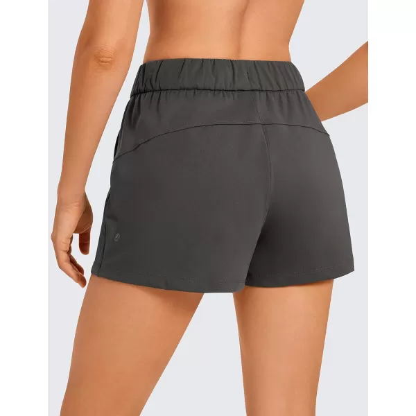 CRZ YOGA Stretch Shorts for Women Work Casual 25  Athletic Shorts with Pockets for Workout Travel Hiking GolfMountain Green