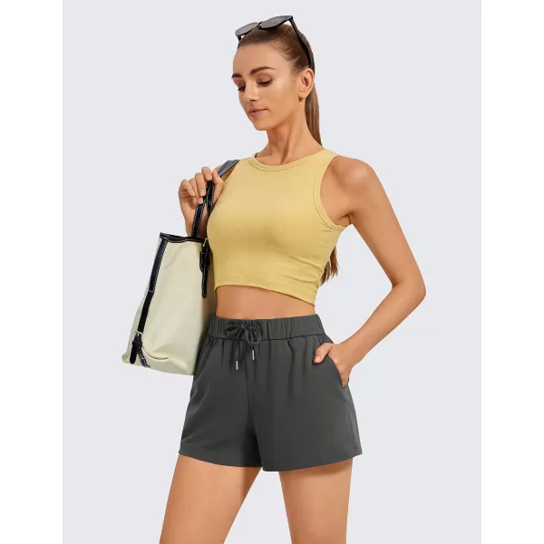 CRZ YOGA Stretch Shorts for Women Work Casual 25  Athletic Shorts with Pockets for Workout Travel Hiking GolfMountain Green