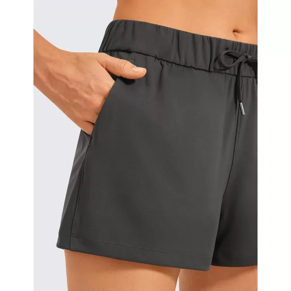 CRZ YOGA Stretch Shorts for Women Work Casual 25  Athletic Shorts with Pockets for Workout Travel Hiking GolfMountain Green