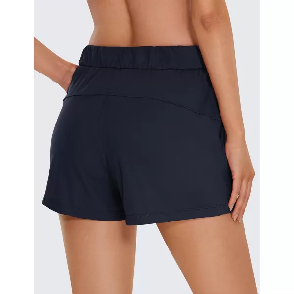 CRZ YOGA Stretch Shorts for Women Work Casual 25  Athletic Shorts with Pockets for Workout Travel Hiking GolfNavy