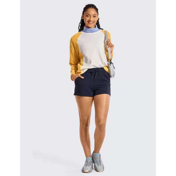 CRZ YOGA Stretch Shorts for Women Work Casual 25  Athletic Shorts with Pockets for Workout Travel Hiking GolfNavy