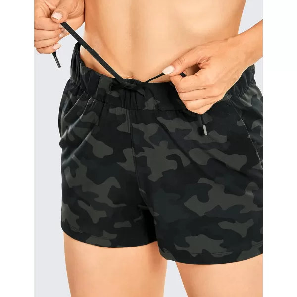 CRZ YOGA Stretch Shorts for Women Work Casual 25  Athletic Shorts with Pockets for Workout Travel Hiking GolfOlive Camouflage