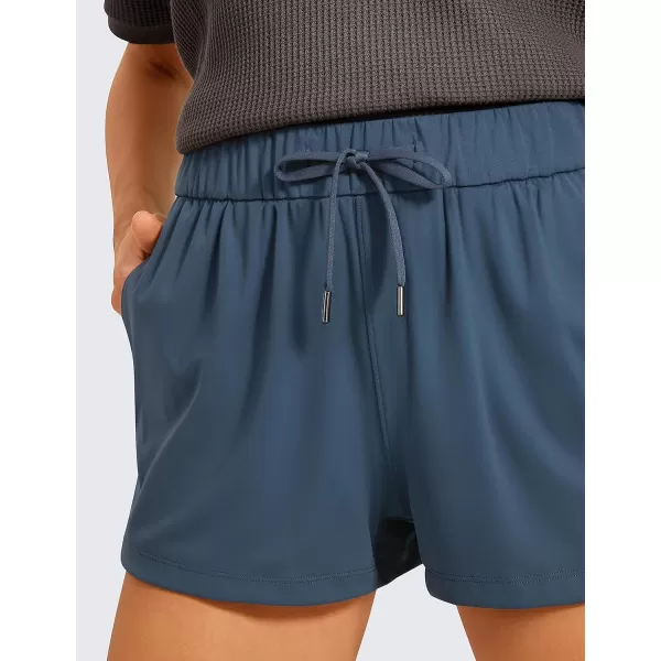 CRZ YOGA Stretch Shorts for Women Work Casual 25  Athletic Shorts with Pockets for Workout Travel Hiking GolfSlate Blue