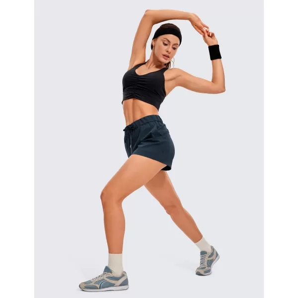 CRZ YOGA Stretch Shorts for Women Work Casual 25  Athletic Shorts with Pockets for Workout Travel Hiking GolfTrue Navy