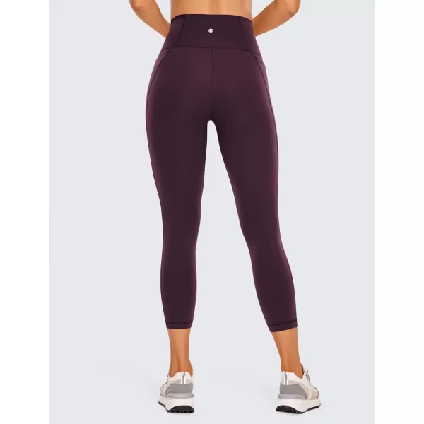 CRZ YOGA Womens Butterluxe Workout Capri Leggings with Pockets 21 Inches  High Waisted Gym Athletic Crop Yoga LeggingsDeep Purple