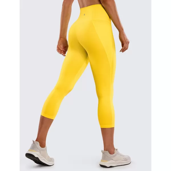 CRZ YOGA Womens Butterluxe Workout Capri Leggings with Pockets 21 Inches  High Waisted Gym Athletic Crop Yoga LeggingsHigh Visibility Yellow