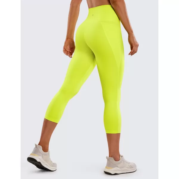 CRZ YOGA Womens Butterluxe Workout Capri Leggings with Pockets 21 Inches  High Waisted Gym Athletic Crop Yoga LeggingsNeon Yellow