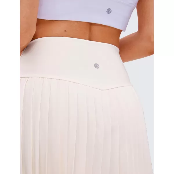 CRZ YOGA Womens High Waisted Pleated Tennis Skirts with Pockets Tummy Control Casual Liner Skorts A Line Workout Golf SkirtsMilky White Bone