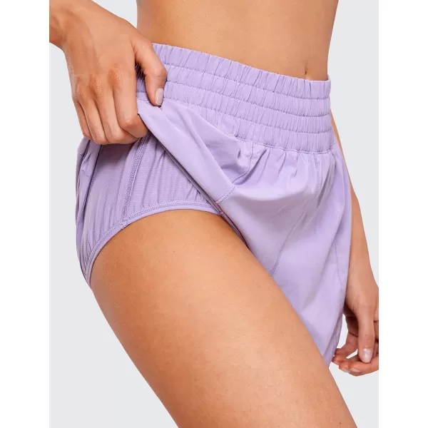 CRZ YOGA Womens High Waisted Running Shorts 4  Mesh Liner Lightweight Gym Sport Athletic Workout Shorts with Zipper PocketLilac