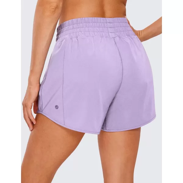 CRZ YOGA Womens High Waisted Running Shorts 4  Mesh Liner Lightweight Gym Sport Athletic Workout Shorts with Zipper PocketLilac