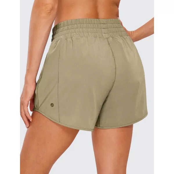 CRZ YOGA Womens High Waisted Running Shorts 4  Mesh Liner Lightweight Gym Sport Athletic Workout Shorts with Zipper PocketMountain Olive