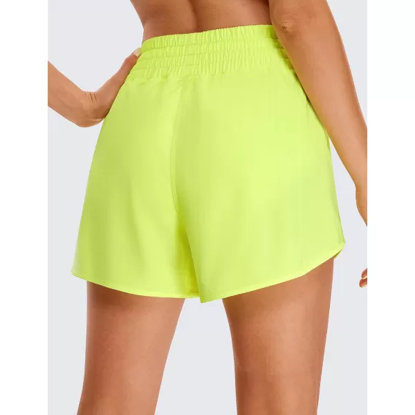 CRZ YOGA Womens High Waisted Running Shorts 4  Mesh Liner Lightweight Gym Sport Athletic Workout Shorts with Zipper PocketNeon Yellow