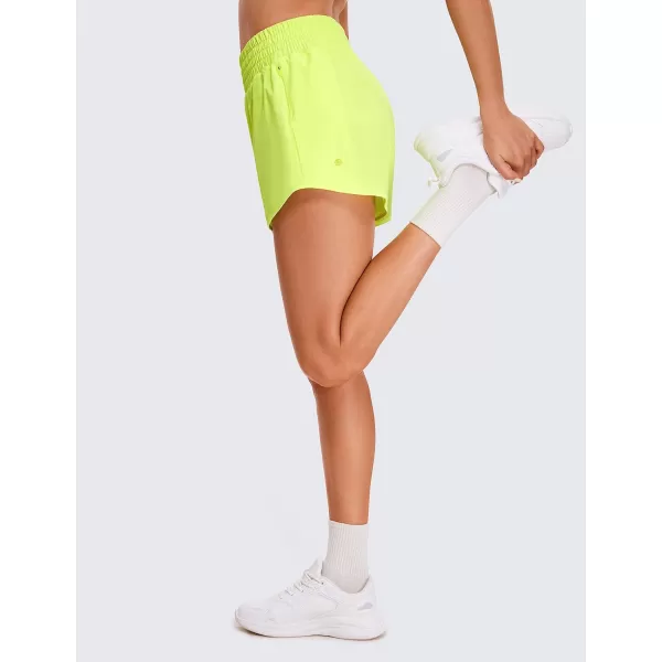 CRZ YOGA Womens High Waisted Running Shorts 4  Mesh Liner Lightweight Gym Sport Athletic Workout Shorts with Zipper PocketNeon Yellow