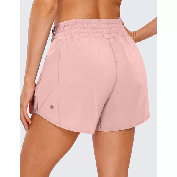 CRZ YOGA Womens High Waisted Running Shorts 4  Mesh Liner Lightweight Gym Sport Athletic Workout Shorts with Zipper PocketPuff Pink