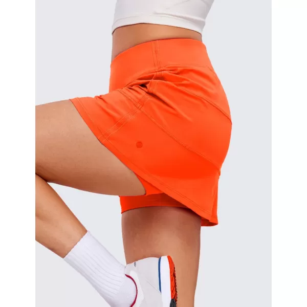 CRZ YOGA Womens High Waisted Tennis Skirts with 3 Pockets Golf Skirts A Line Lightweight Cute Athletic Casual SkortsNeon Orange