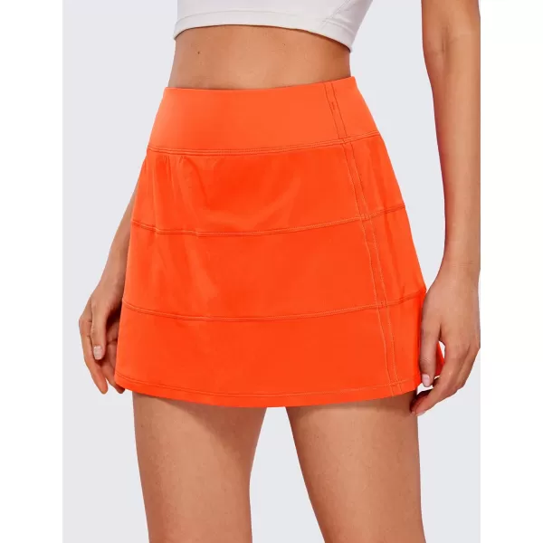 CRZ YOGA Womens High Waisted Tennis Skirts with 3 Pockets Golf Skirts A Line Lightweight Cute Athletic Casual SkortsNeon Orange