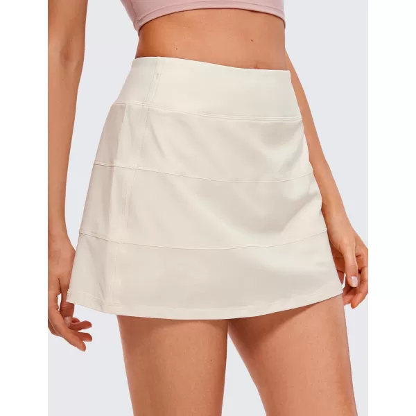 CRZ YOGA Womens High Waisted Tennis Skirts with 3 Pockets Golf Skirts A Line Lightweight Cute Athletic Casual SkortsWhite Apricot