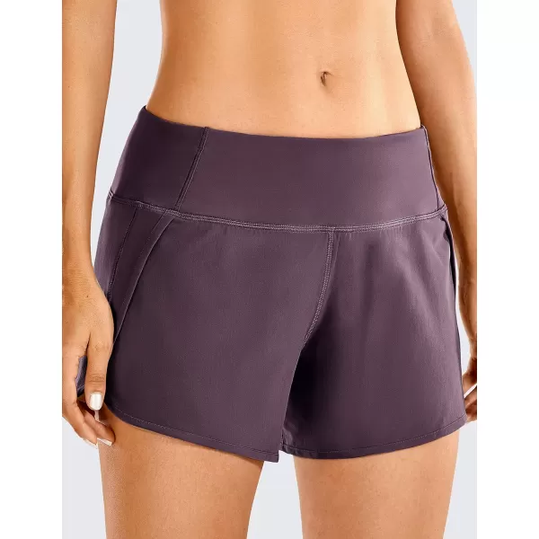 CRZ YOGA Womens Lightweight Gym Athletic Workout Shorts Liner 4  Quick Dry Running Sport Spandex Shorts Mesh Zipper PocketsArctic Plum