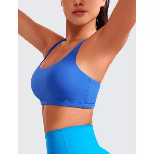 CRZ YOGA Womens Low Impact Strappy Sports Bra  Low Cut Wirefree Padded Yoga Bra Criss Cross BackSparkle Blue