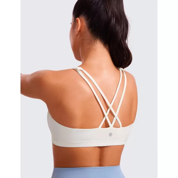 CRZ YOGA Womens Low Impact Strappy Sports Bra  Low Cut Wirefree Padded Yoga Bra Criss Cross BackWhite Apricot