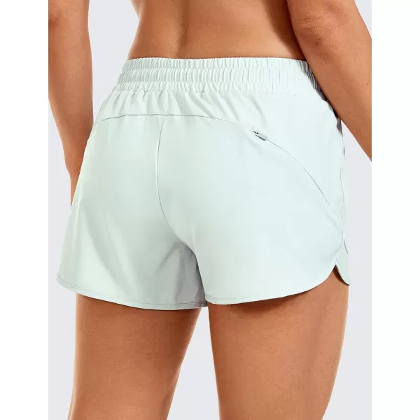 CRZ YOGA Womens Mid Rise Running Shorts Mesh Liner 3  Quick Dry Drawstring Workout Athletic Gym Shorts Zip PocketCoconut Milk White