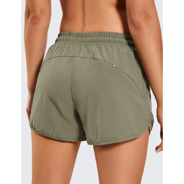 CRZ YOGA Womens Mid Rise Running Shorts Mesh Liner 3  Quick Dry Drawstring Workout Athletic Gym Shorts Zip PocketMountain Olive