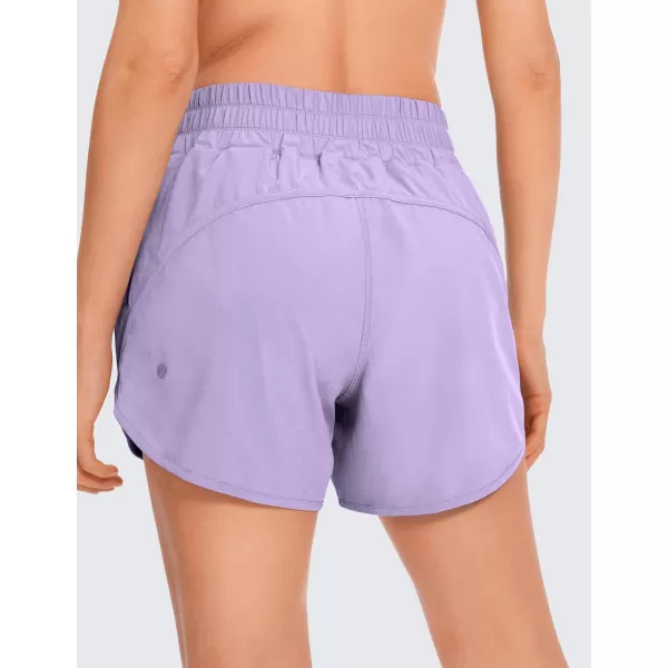 CRZ YOGA Womens Mid Waisted Running Shorts Liner  5 Quick Dry Athletic Sport Workout Track Shorts Zip PocketLilac