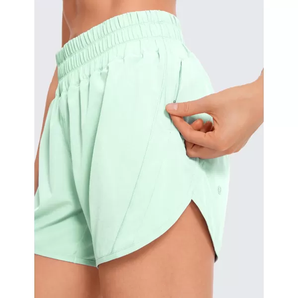 CRZ YOGA Womens Mid Waisted Running Shorts Liner  5 Quick Dry Athletic Sport Workout Track Shorts Zip PocketMint Moment