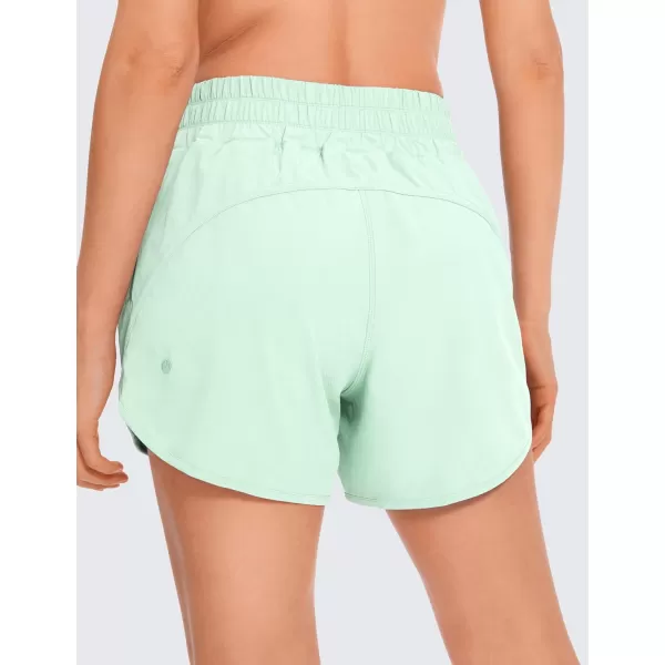 CRZ YOGA Womens Mid Waisted Running Shorts Liner  5 Quick Dry Athletic Sport Workout Track Shorts Zip PocketMint Moment